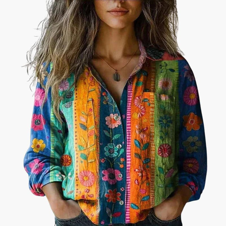 Women’s button down shirt with long sleeves and collar